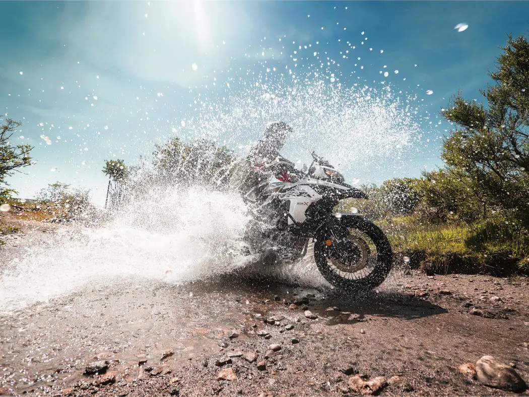 TRK502X splashing water while crossing