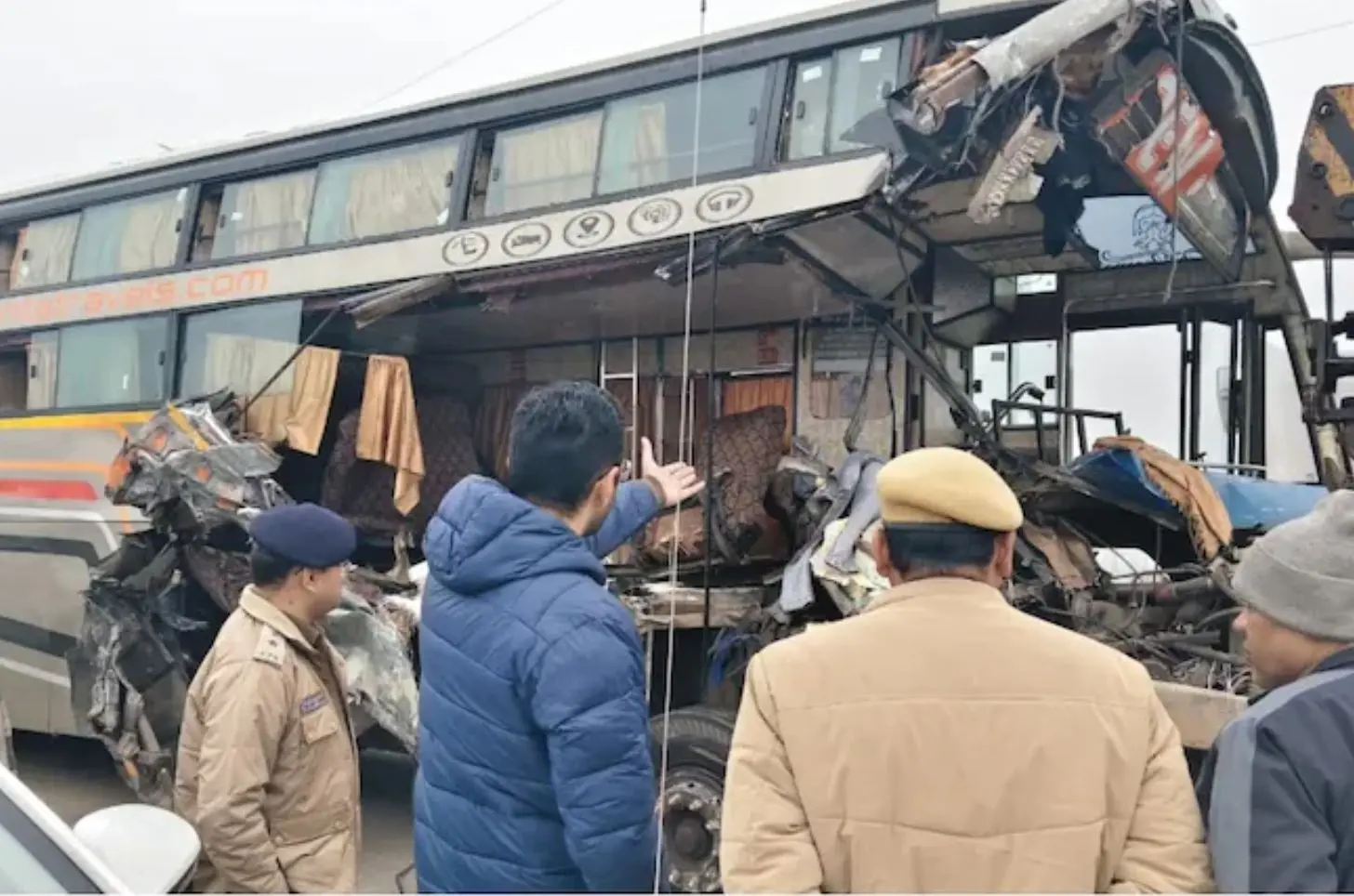Rajasthan road accident bus crashes parked trailer bharatpur